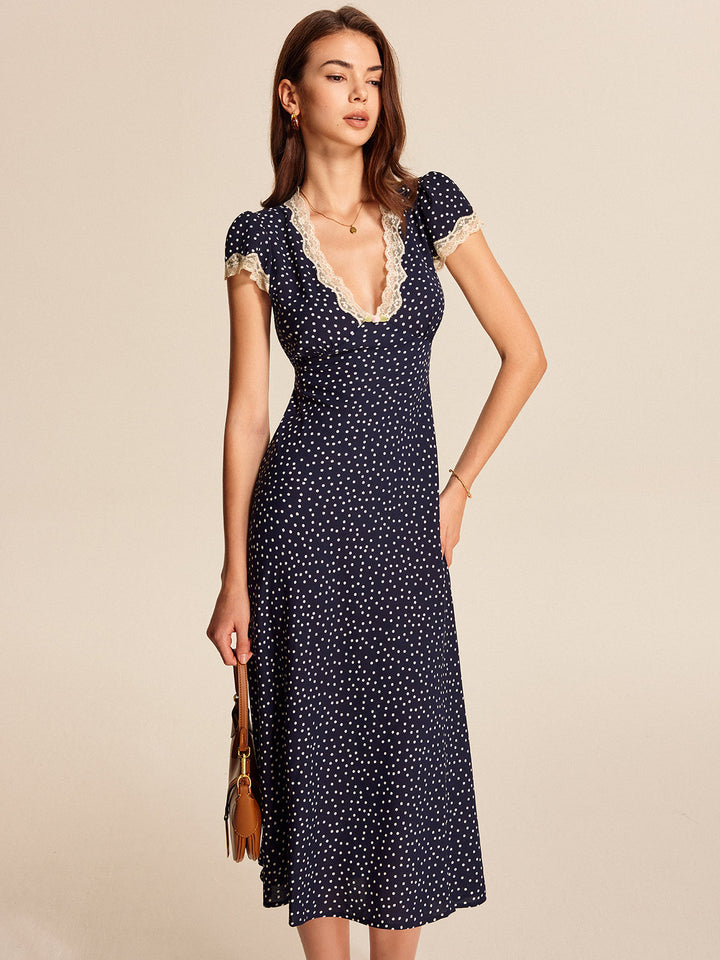Abito con pizzo a pois