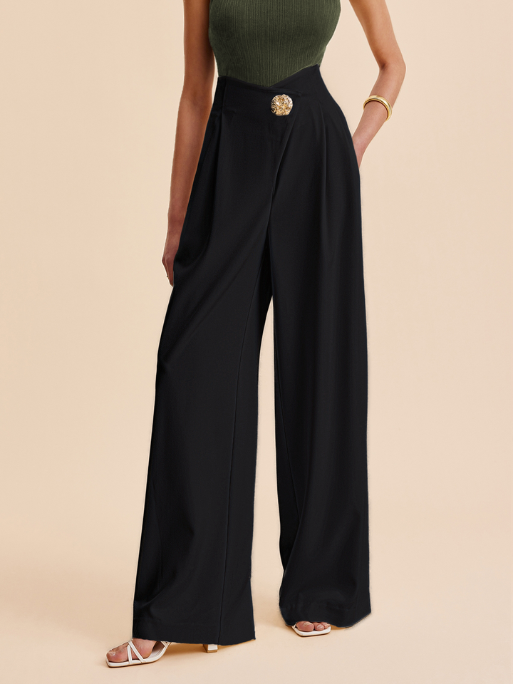 Pantaloni a gamba larga con vita alta e decorazioni